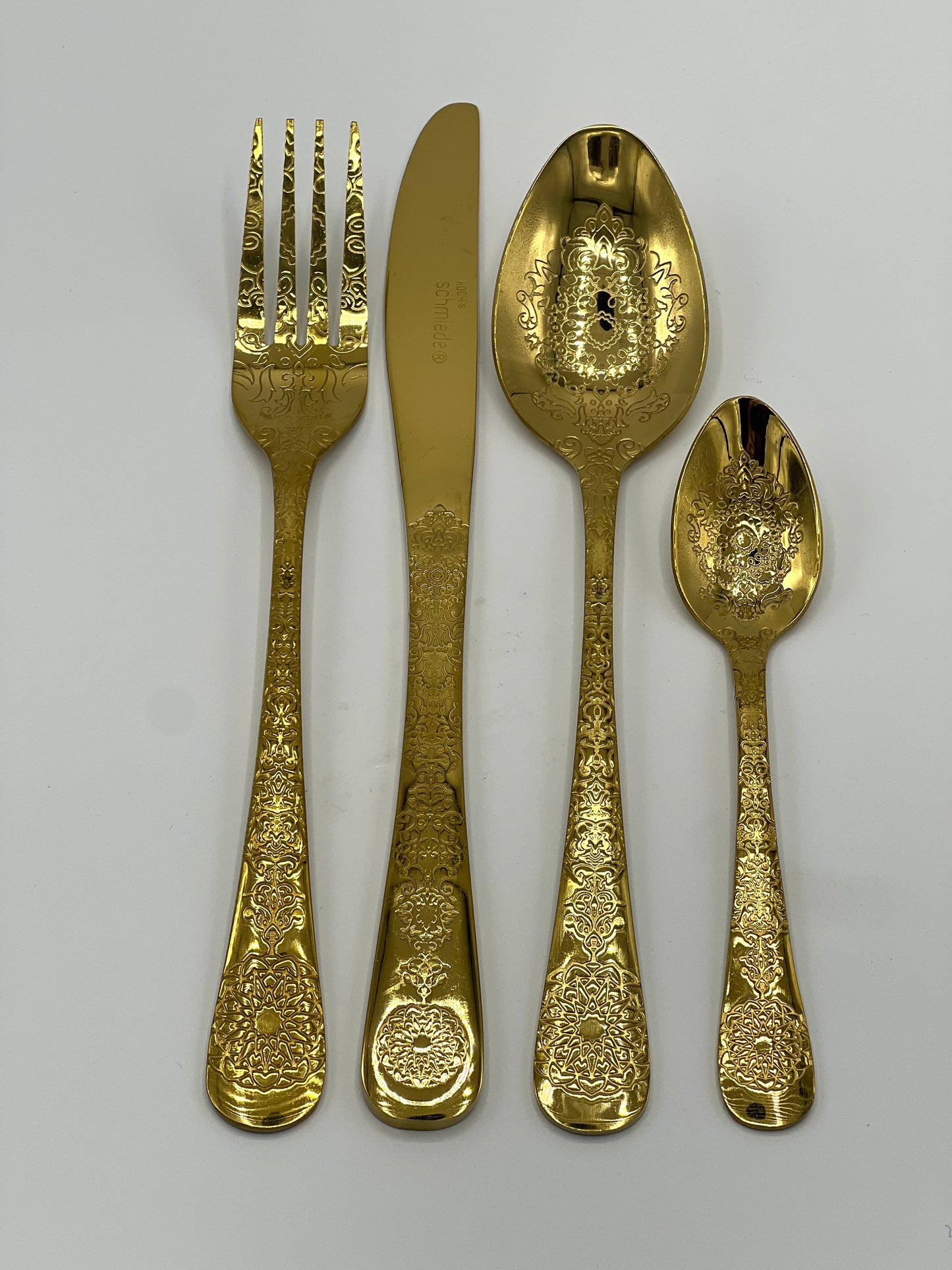 Gouden mes met motief