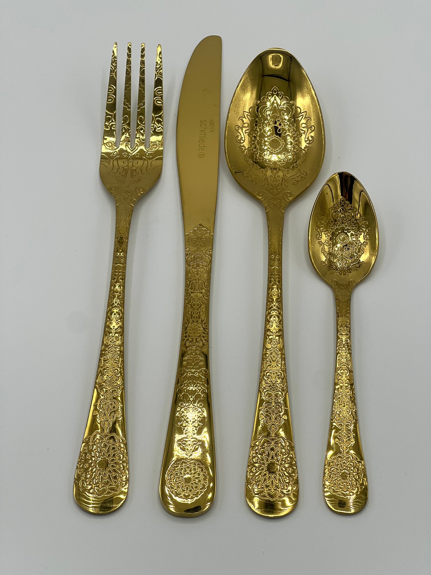 Gouden vork met motief